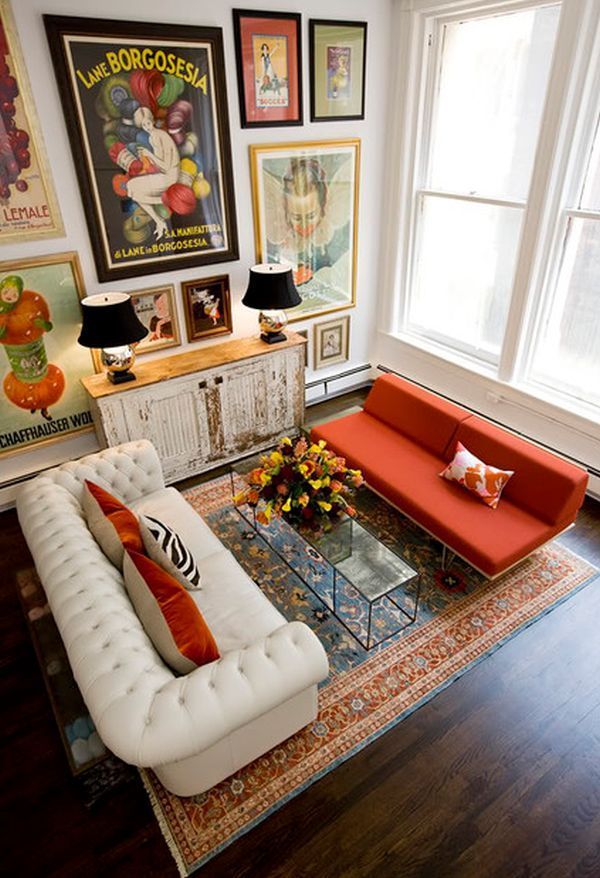 I love this eclectic living room. White, black and red but with so many patterns and textures.