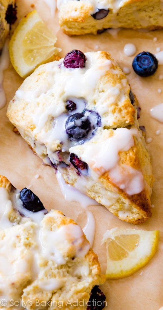 My go-to scone recipe used for nearly ANY add-ins! Here they are with juicy blueberries and sweet lemon glaze!