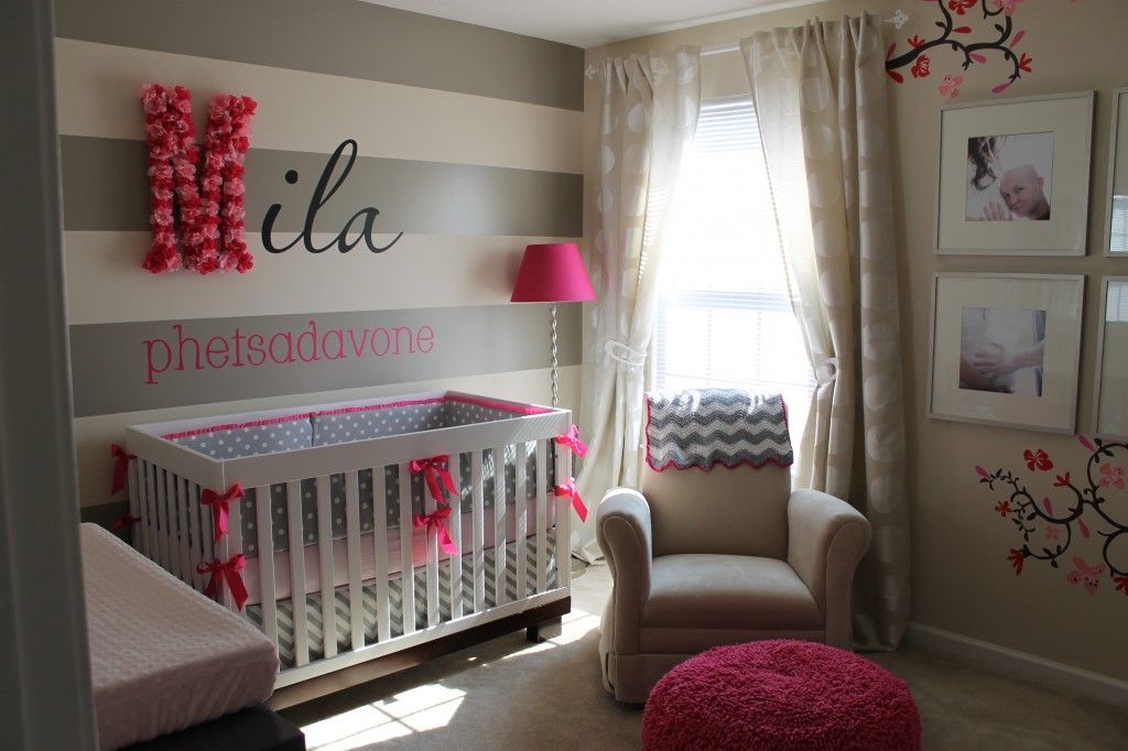 Really sweet baby girl nursery. Could switch pink for blue or green to work for a boy.