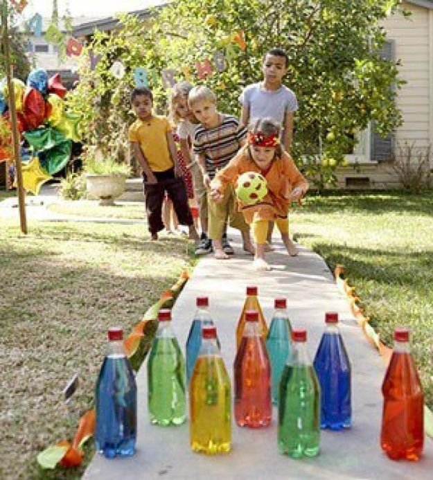 Break glow sticks into bottles of water for some nighttime lawn bowling action. | 32 Cheap And Easy Backya