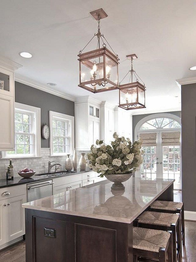 Bright and open. Love the lanterns. Layout it great. Pantry or laundry by the door.