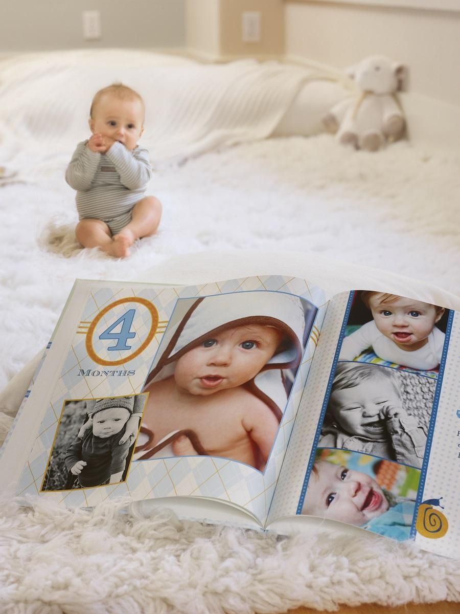 Capture the memories of baby’s first year with a month by month baby photo book. | Shutterfly