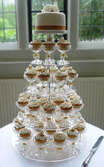 Cupcakes in champagne glasses.