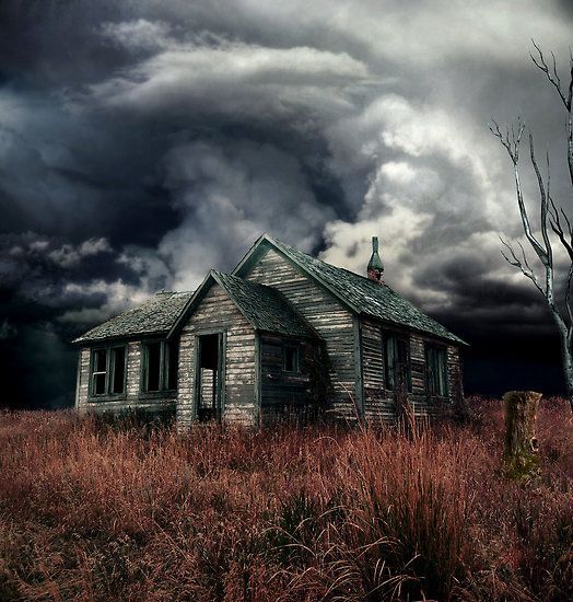 Dark clouds approach an abandoned home that has already seen it’s share of storms.