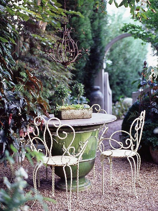 Make an Instant Table Turn a large urn or planter into a quick and colorful outdoor table. Simply cover th