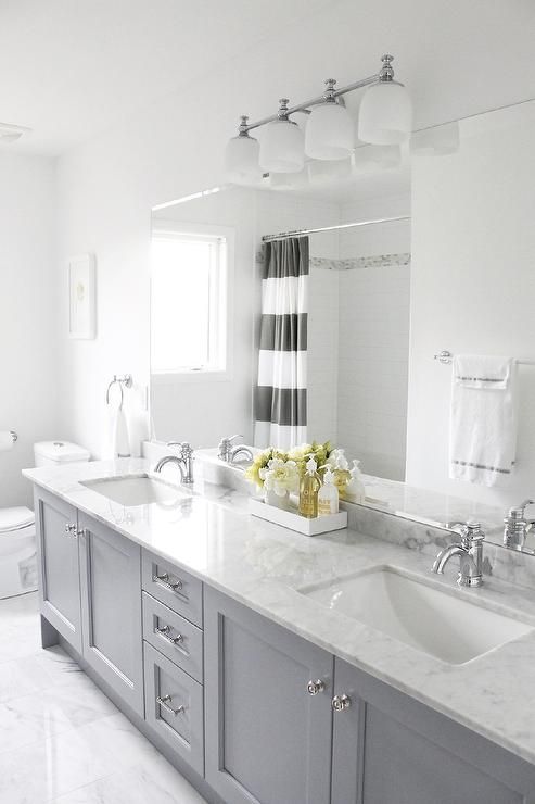 source: AM Dolce Vita Gray Yellow Bathroom, Bianco Carrara floor, Vanity in Benjamin Moore Pigeon Gray, Bi