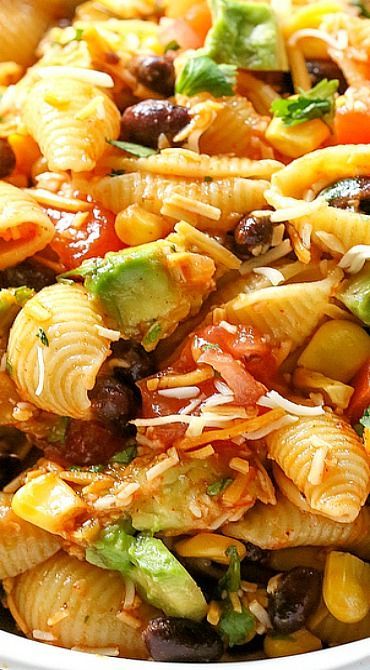 Taco Pasta Salad ~ filled with black beans, corn, cilantro, avocados, and tomatoes. It’s tossed in a vin