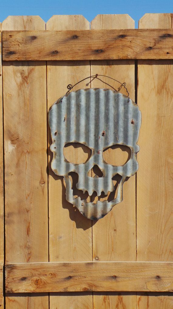 Upcycled old Corrugated Metal Skull by RockinBTradingCo on Etsy, $25.00