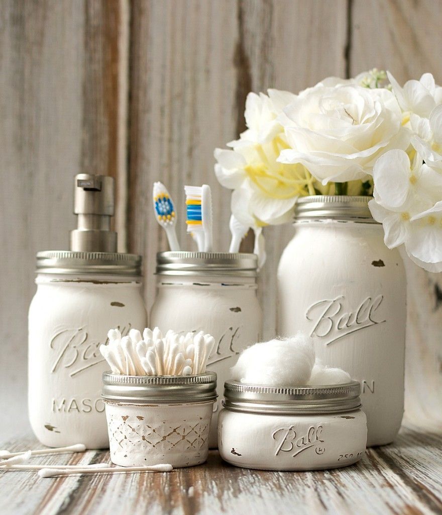 A DIY tutorial on how to make your own mason jar bathroom storage, accessory set.Includes how to paint and