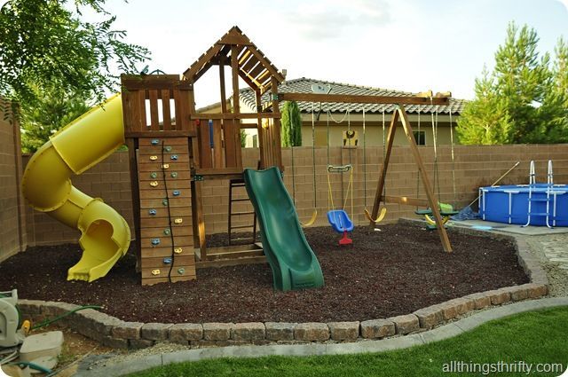 An entire DIY playground complete with rubber mulch!