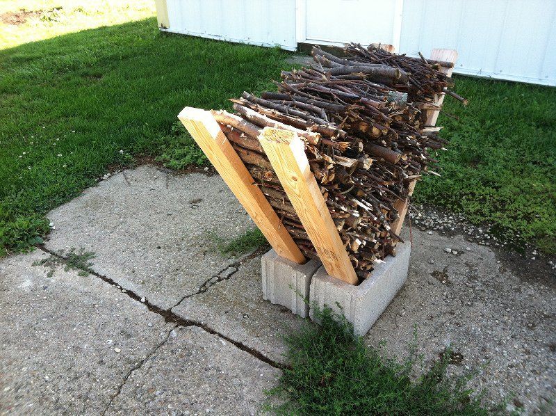Easy Firewood Storage Using Cinder Blocks…for our fire pit!!