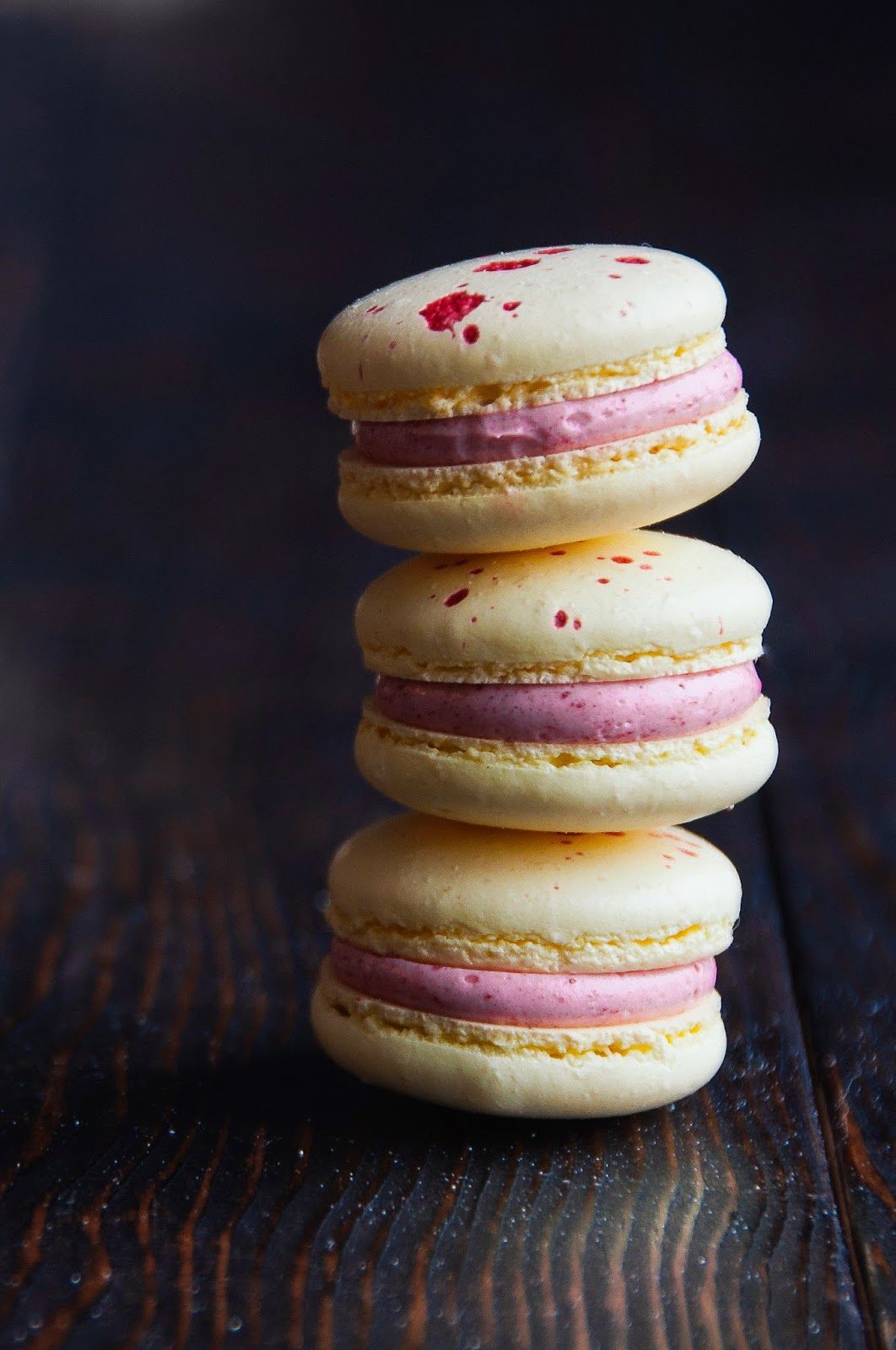 Lemon Raspberry Macarons – lemon macarons and curd with raspberry French buttercream (recipe) | Hint of Va