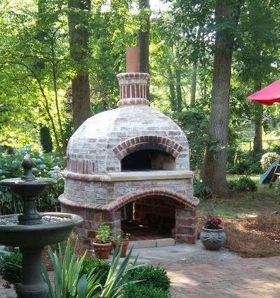 Love this outdoor brick oven!  on Home Grown Blog