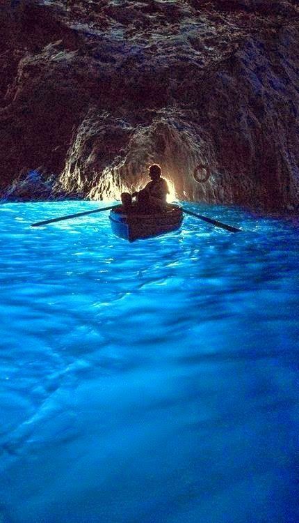 The Blue Grotto, Capri Italy. One of the most amazing thing I’ve seen.. The sunlight shines in a cave with