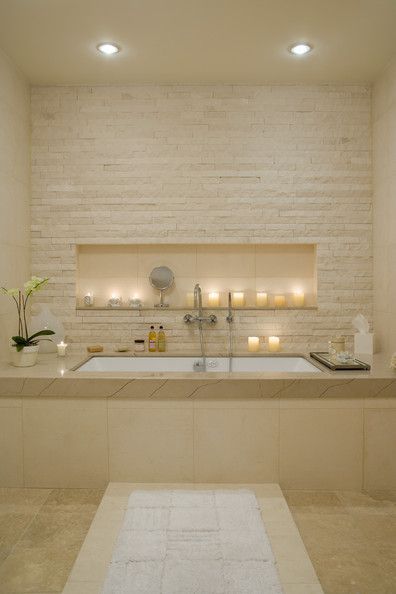 The inset shelf above the tub is really nice. I also like the tile on the wall.