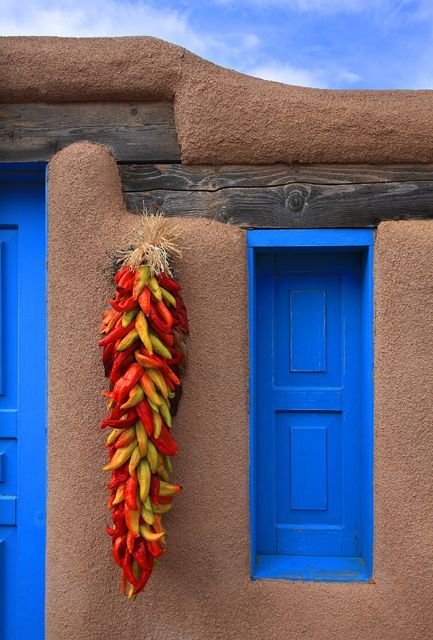 Chile ristras are common decorations around doors and windows on homes in New Mexico  #KlausPriebe