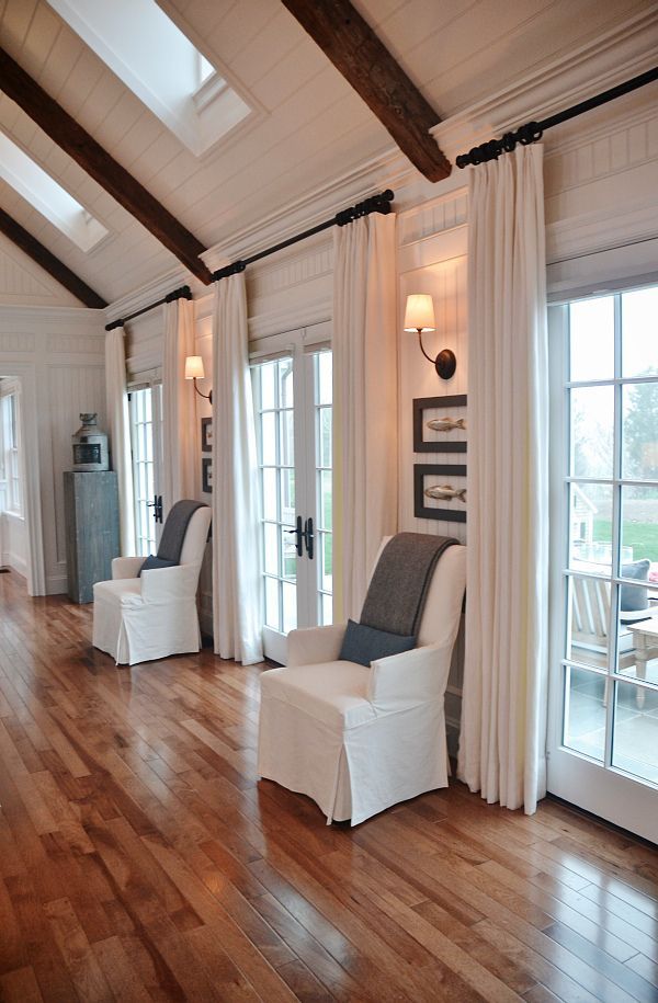 cozy neutral living room – all the windows & the doors.