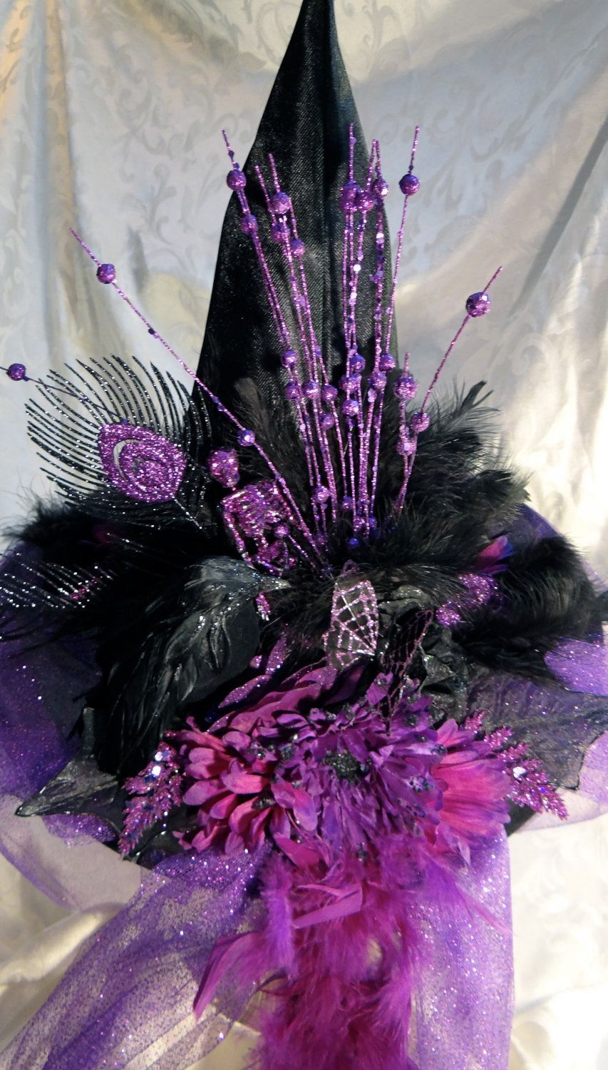 Karens  Black Peacock Witch Hat. $68.00, via Etsy.