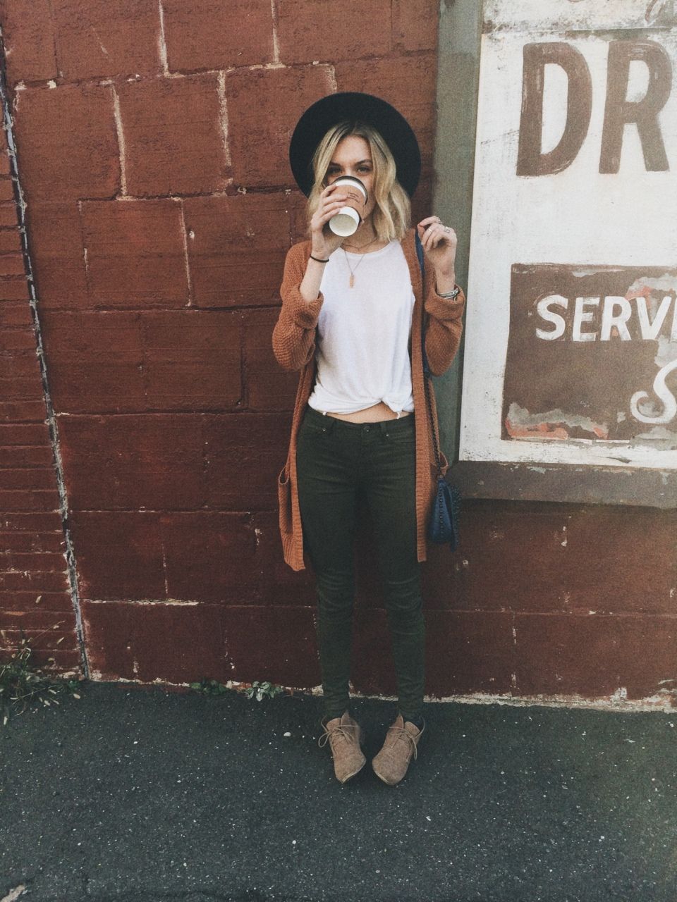 Long sweater and a white tee And coffee