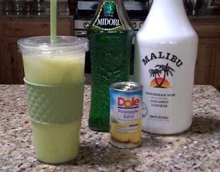 scooby snack drink with midori, coconut rum and pineapple juice