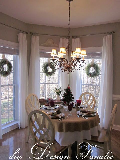 windows for dining area-would be nice if sunroom went off of kitchen and then wrapped to the edge of t