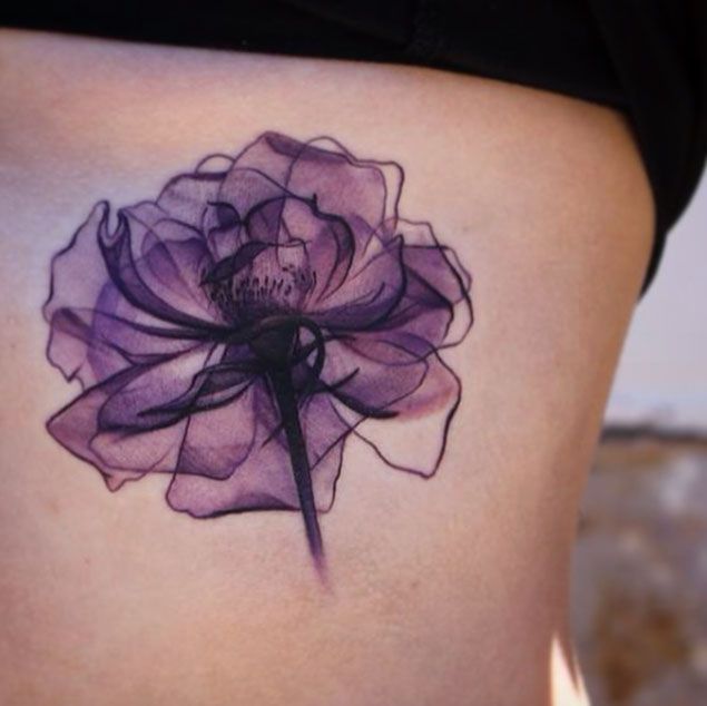 Purple X-ray flower tattoo
