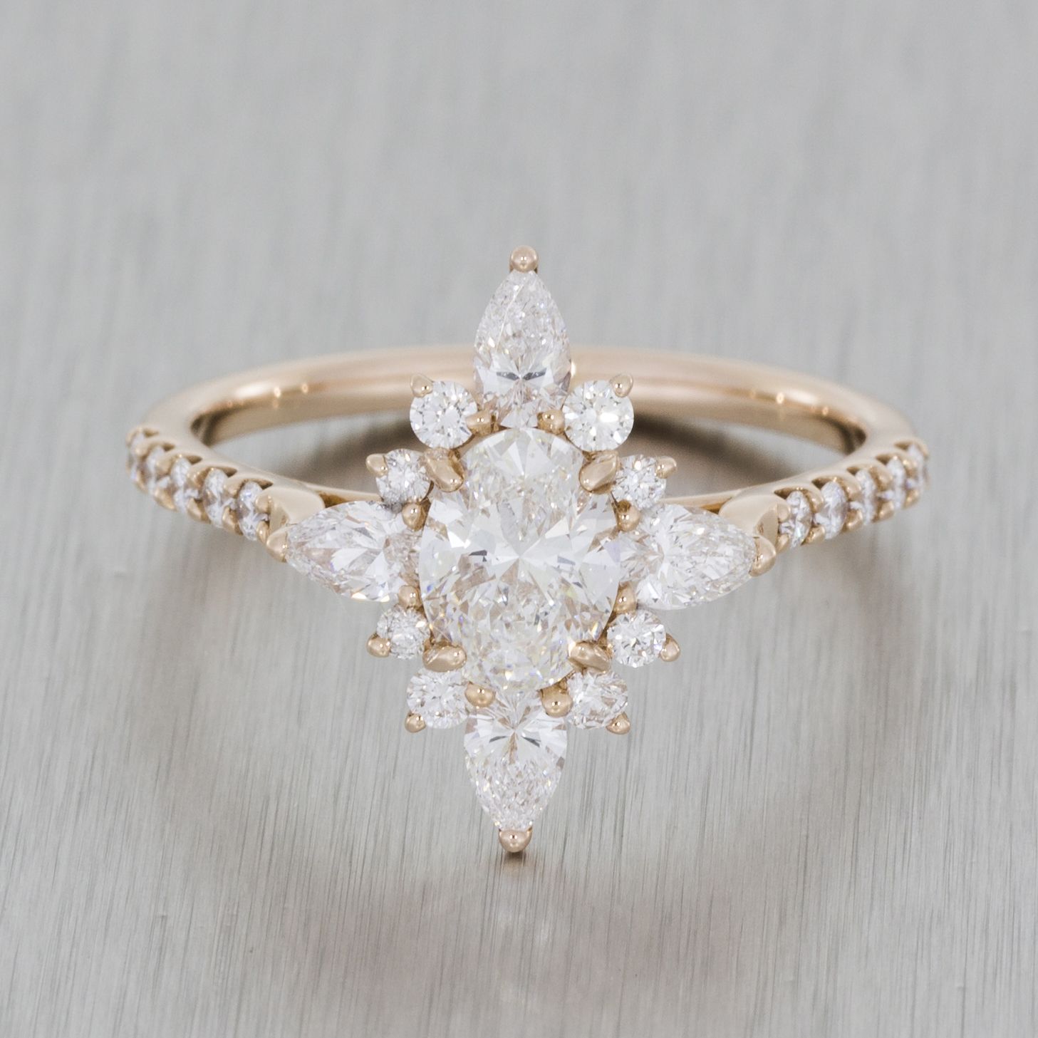 Rose gold vintage ballerina engagement ring. Marquise oval diamond with hidden peak stone, fishtail /