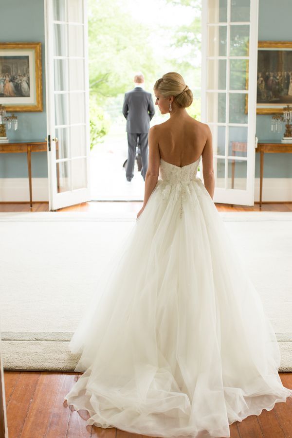 The bride was stunning in a strapless ball gown featuring an embroidered bodice.