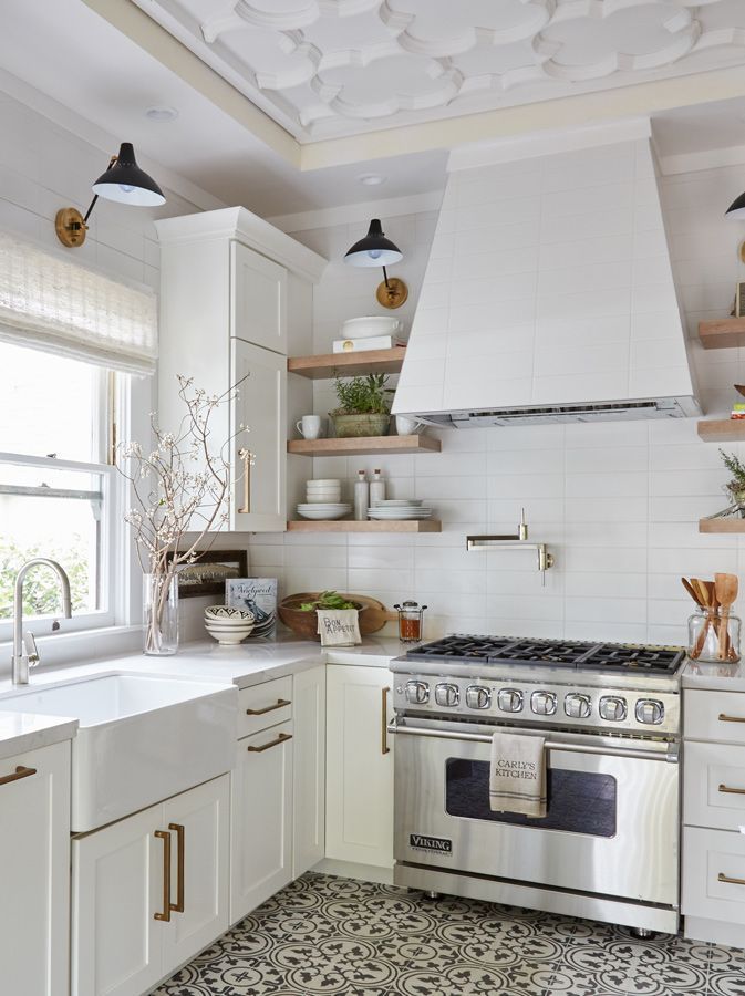white range hood and cement decorative tile floor kitchen