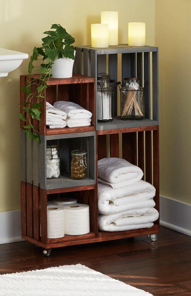 Bathroom storage on wheels!  Ordinary wooden crates come together for this attractive and handy bathro