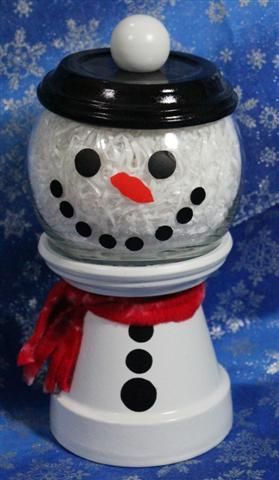 Snowman candy jar made from clay pot and saucers. :) Would be a good hostess gift at Christmastime for
