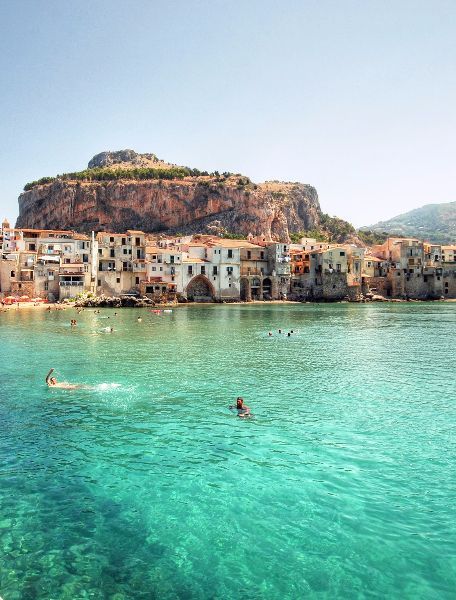 The beautiful town of Cefalù located in Sicily, Italy. For the best of art, food, culture, travel, he