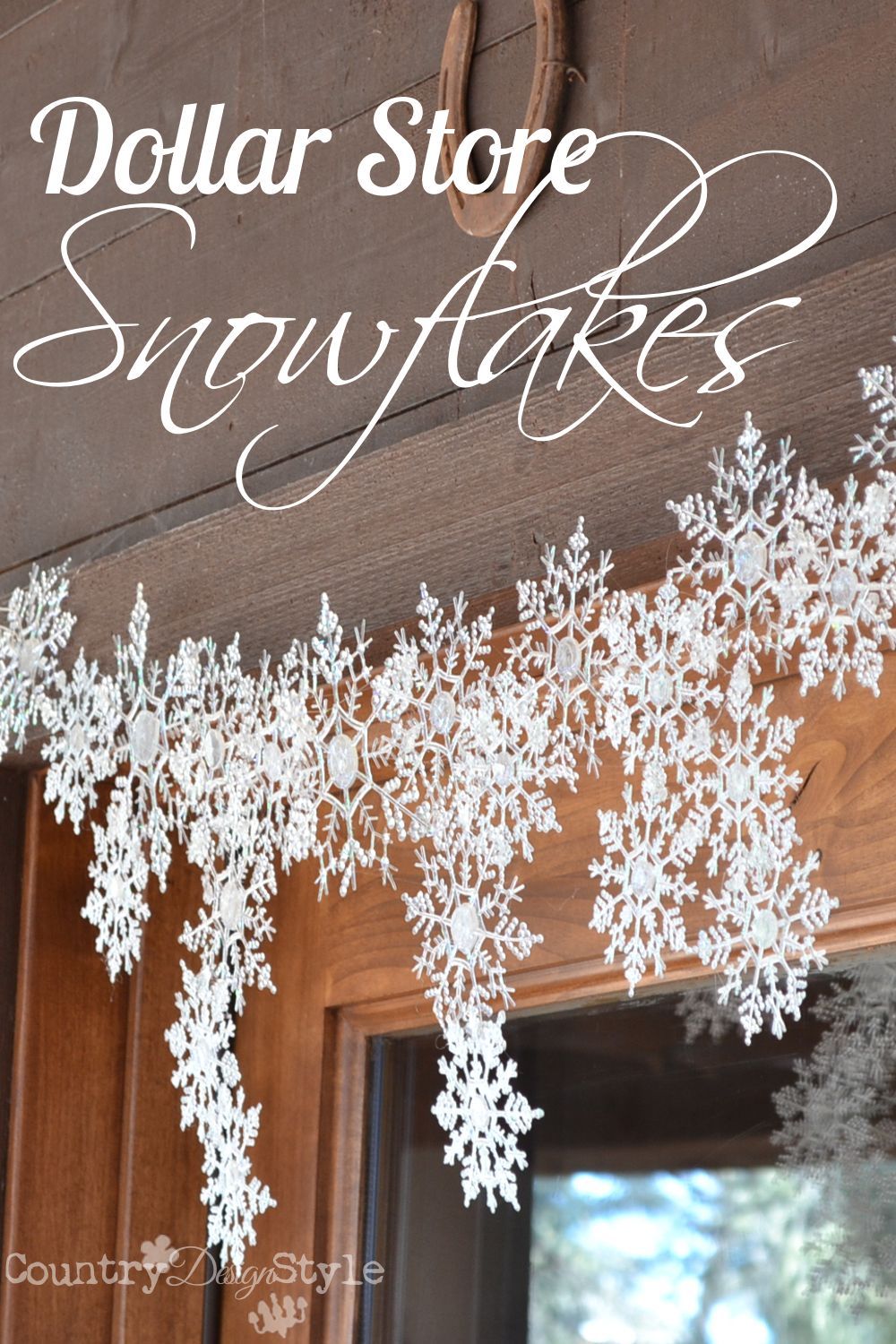 Melting snowflakes with a hot glue gun! Dollar store snowflakes hanging over our f