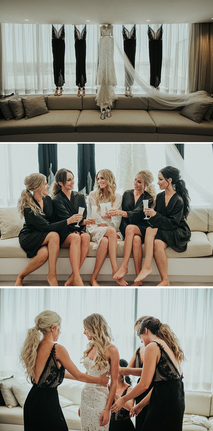 Modern bridal party styling with bridesmaids in black robes and dresses | Shannon