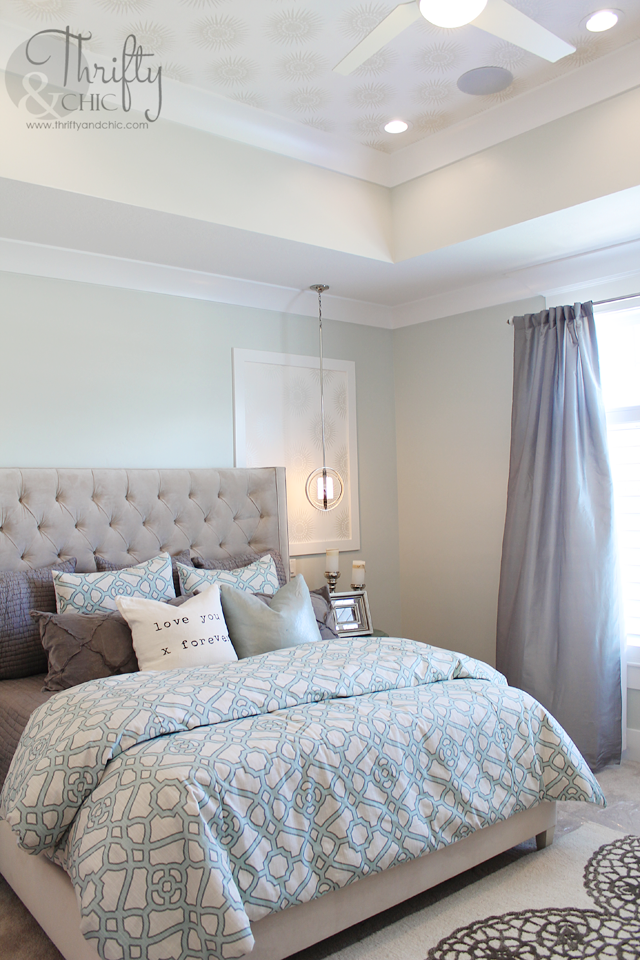 Soothing paint colors of blue and grey for this master bedroom. Thrifty and Chic –