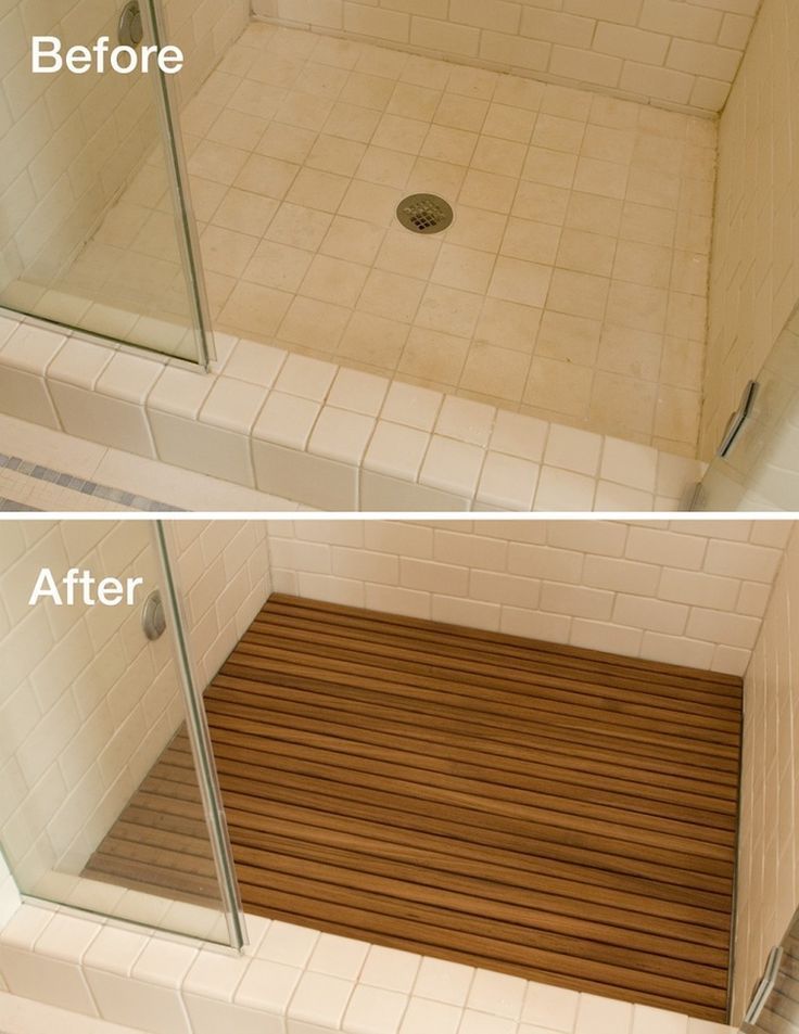 Adding teak to your shower floor instantly upgrades the look and hides the ugly dr