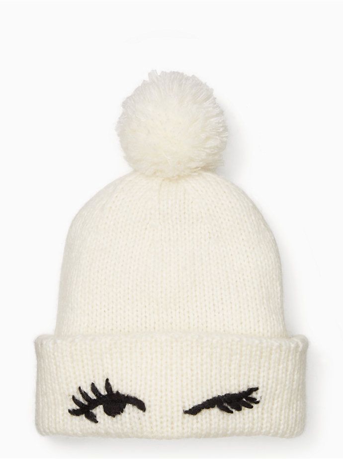 eyes up here: this adorable knit beanie is finished with a wink, resulting in a st
