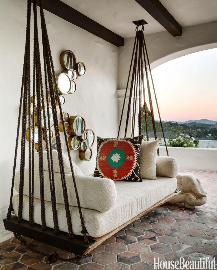 Hanging outdoor bed | love the ropes and rings | House Beautiful via Centsational