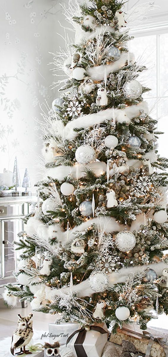 Holiday decorating – White on white Christmas tree with woodland creatures and whi