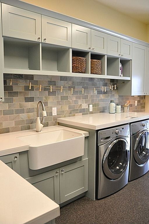 laundry room...I love the color of the cabinets and the farm house sink