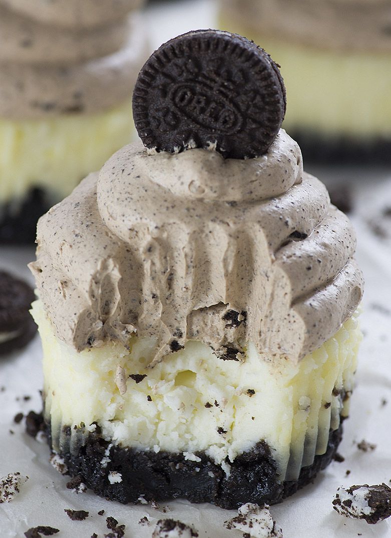 Mini Cheesecakes with thick Oreo cookie crust topped with light and creamy chocola