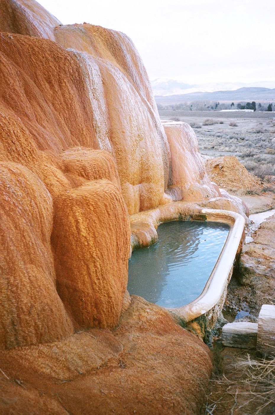 Monroe, Utah. hundred year-old bathtubs of warm healing mineral waters with sunset