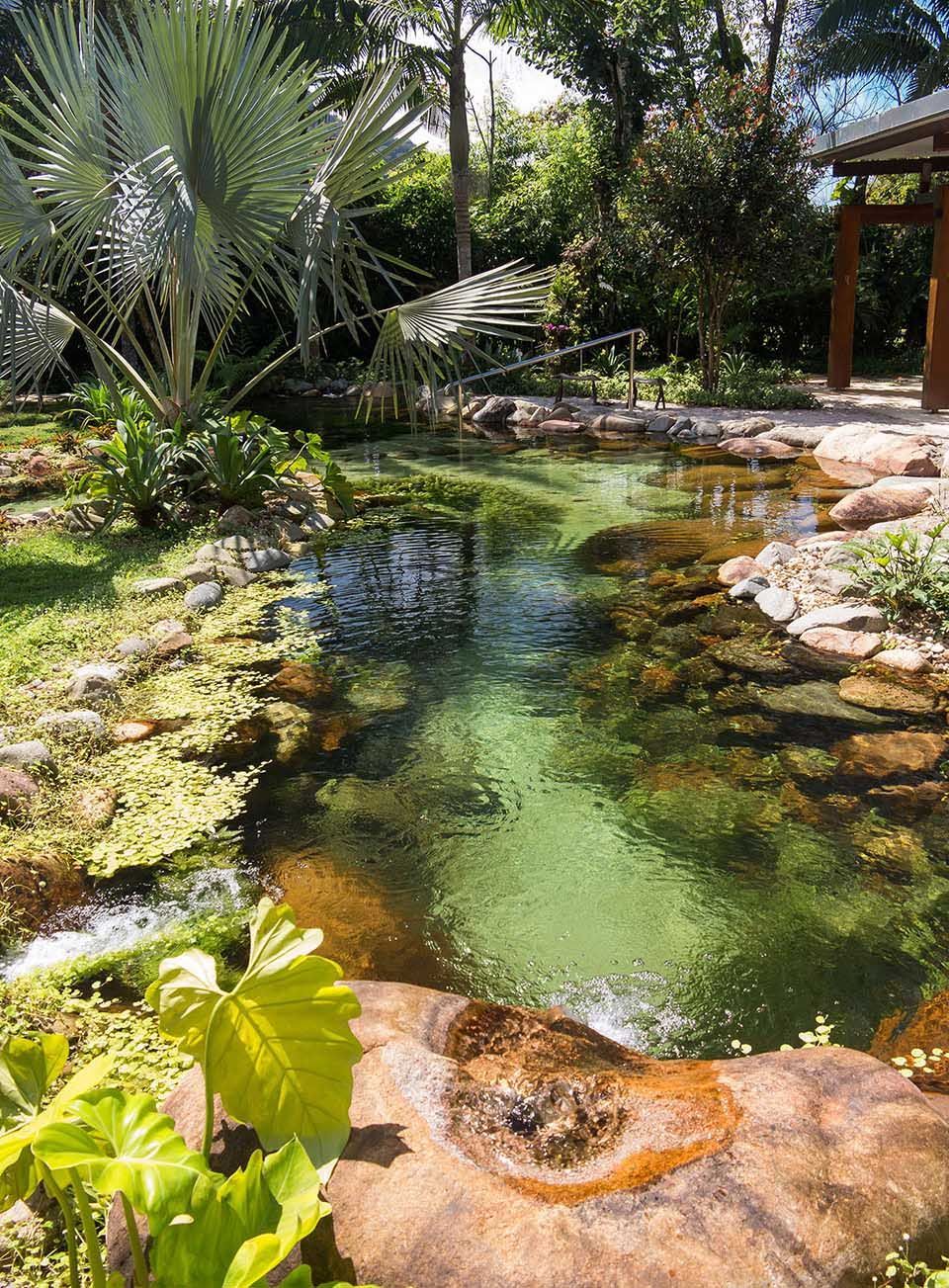 Natural Pool – designed by Peter Nitsche, with large, smooth granite boulders and