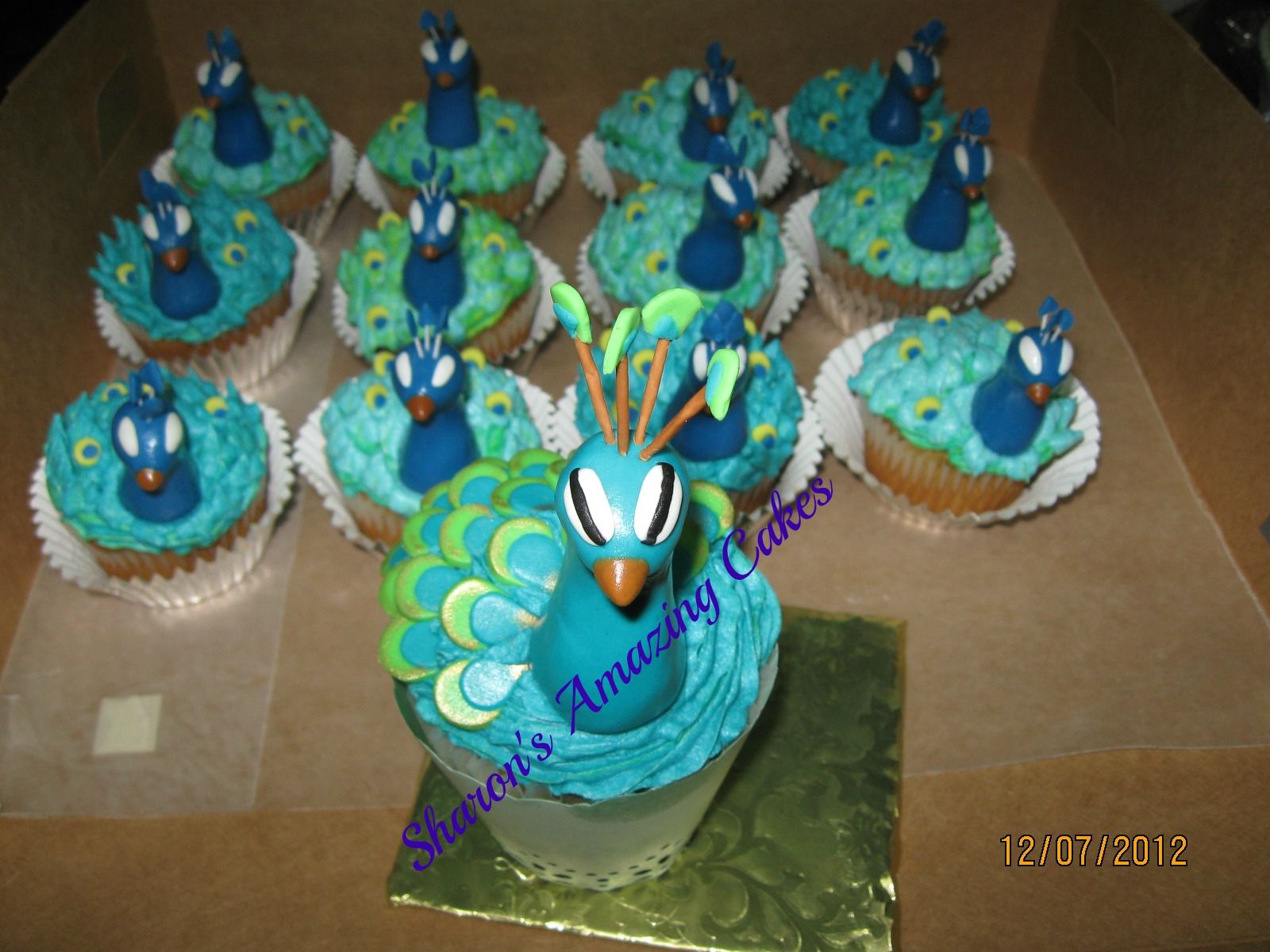 Peacock color cupcakes Ideas