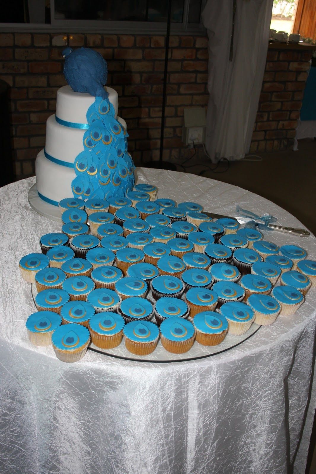 Image Peacock Wedding Cake And Cupcakes Download -   Peacock color cupcakes Ideas