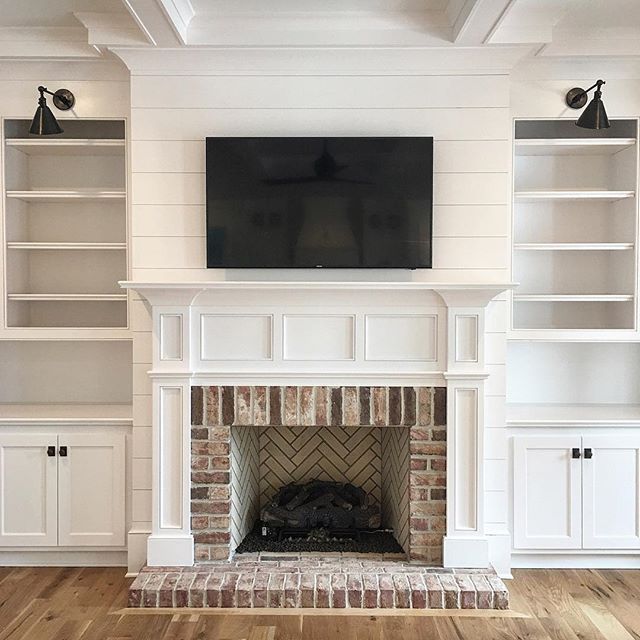 Shiplap and brick fireplace