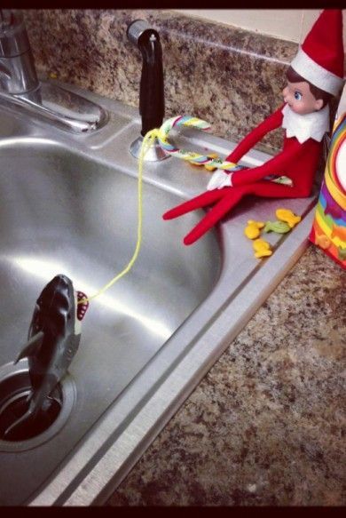 The elf pulled a shark out of the sink!