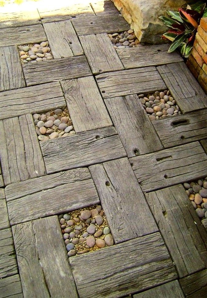 wood pallets “tiles” in backyard. Would be a good cheap way to spruce up