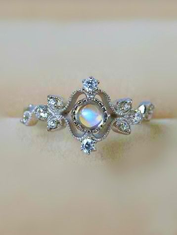 antique art deco moonstone silver engagement ring for her from jewelsin.com