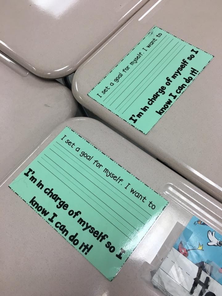 Goal cards taped to kids’ desks. When they reach them, they are moved to kids’ bin